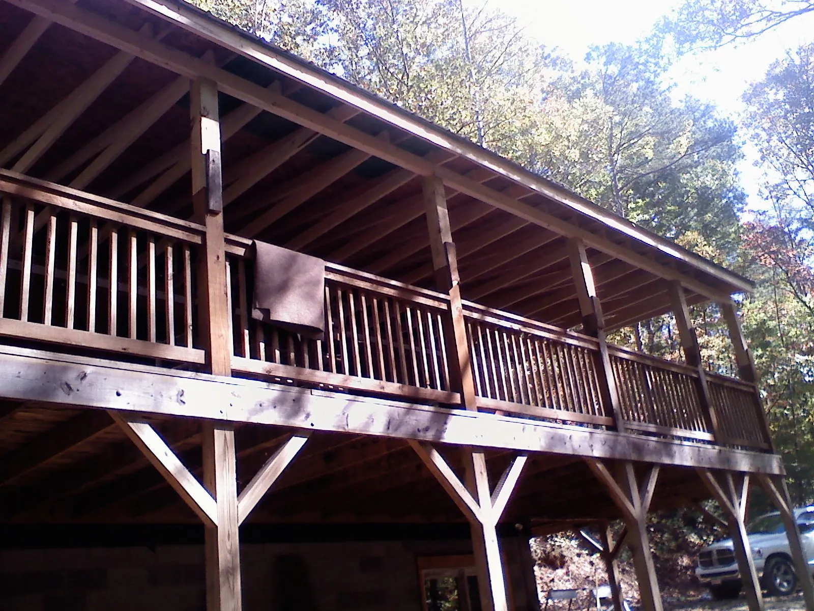 Timber framing under a new elevated porch and deck — Roof Leak Repair in Somers by Roofing Brothers